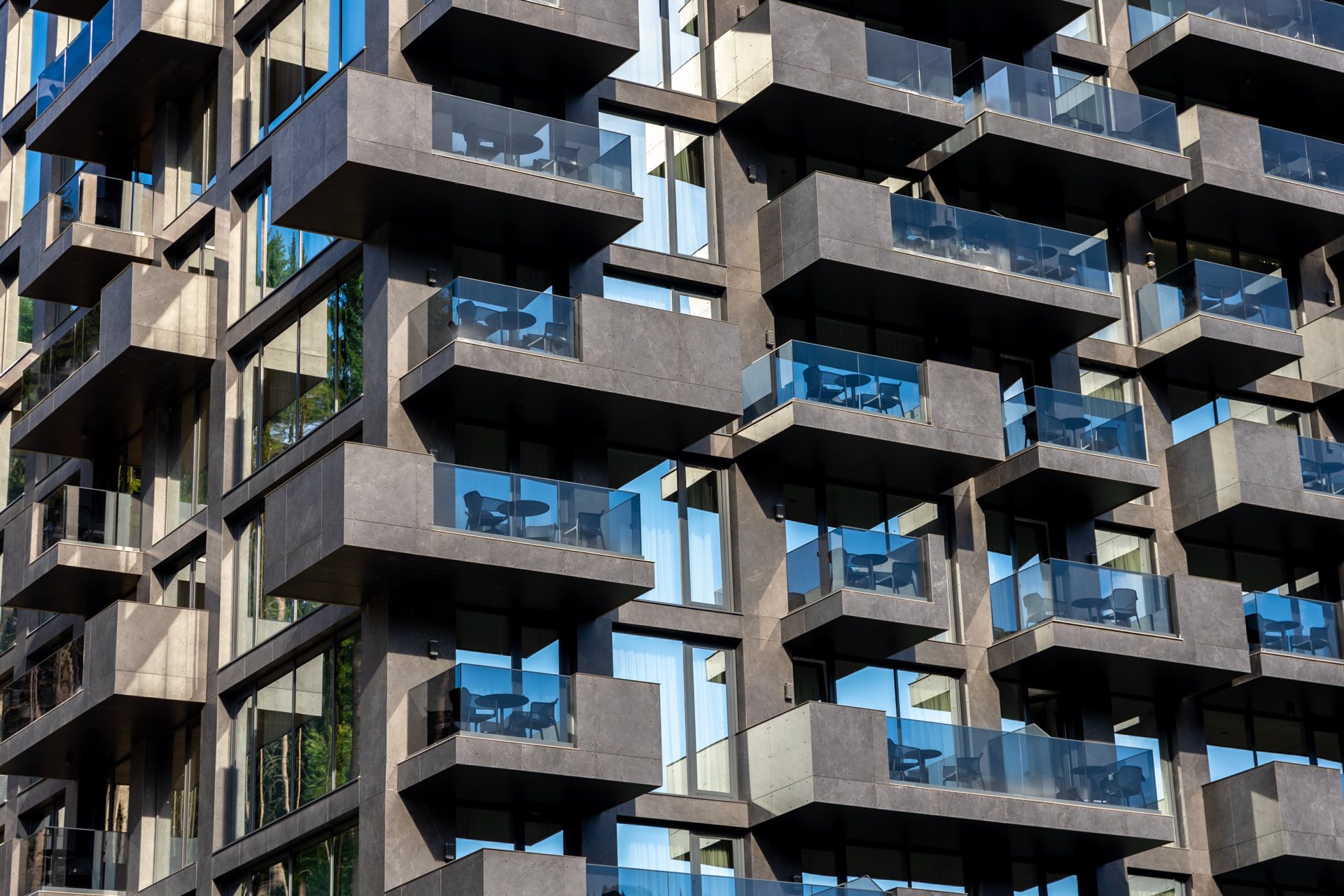 Modern residential building with glass balconies